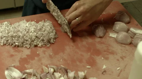 Restaurant Kitchen, Chef Slicing Shallots Stock Footage 61241601