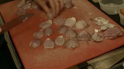 Restaurant Kitchen, Chef Slicing Shallots Stock Footage 61242834