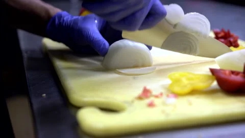 Restaurant kitchen food prep knife slicing onion Stock Footage 156044651