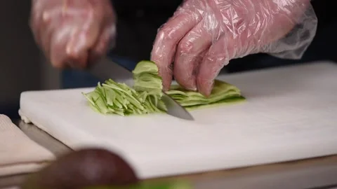 Restaurant kitchen. The process of preparing appetizing Japanese food close-up. 動画素材 169874288
