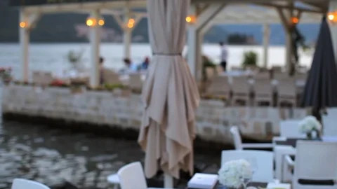 Restaurant by the lake at dusk Stock Footage 92136678