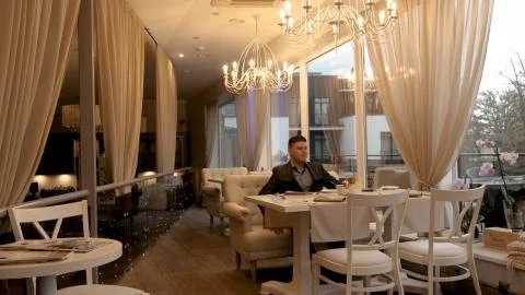 In the restaurant, a man. Stock Photos