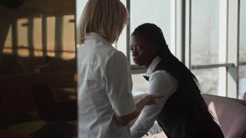 Restaurant Manager Instructing Young Waitress before Opening Stock Footage 309011517