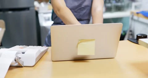 Restaurant manager surfing the web Stock Footage 172470874