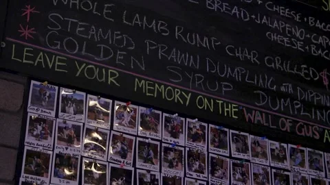 Restaurant Memory Wall Of Instant Photos And Chalkboard Menu Stock Footage 340497860