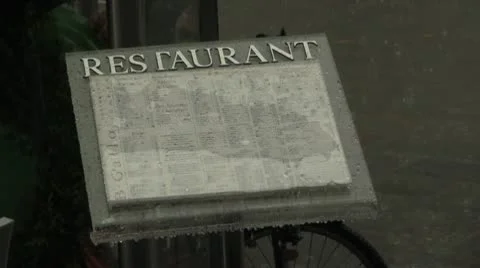 Restaurant Menu in the Rain Stock Footage 10683596