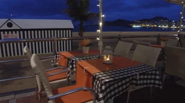 Restaurant next to the Playa de las Canteras beach in Las Palmas Gran Canaria Stock Footage 86069963