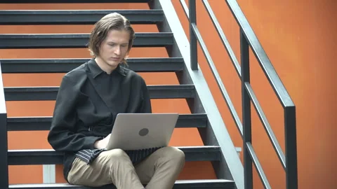 Restaurant owner using computer laptop on stairs . entrepreneurs counting r.. Video stock 242992221