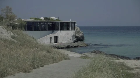Restaurant on the sea rocks Stock Footage 86075869