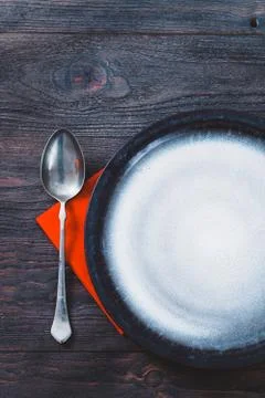 Restaurant series. Dinner with table setting in rustic wood style with cutler Stock Photos