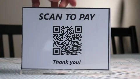 Restaurant Showing a QR Code Payment Card For Clients Stock Footage 140469130