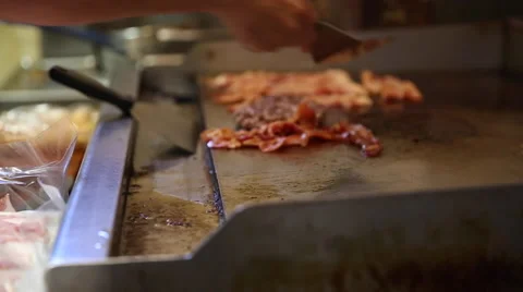 Restaurant sizzles some bacon Stockbeeldmateriaal 45699332