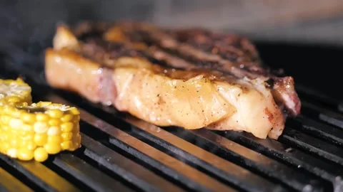 In the restaurant. steak and corn grilled Stock Footage 221118802