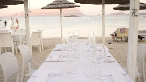 Restaurant table by the beach, Sardinia Stock Footage 93645634
