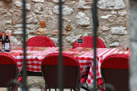 Restaurant table behind bars Stock Photos
