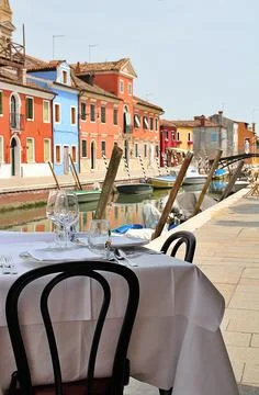 Restaurant table in the Burano Stock Photos