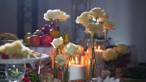 Restaurant table decorated with white roses Video stock 334772092