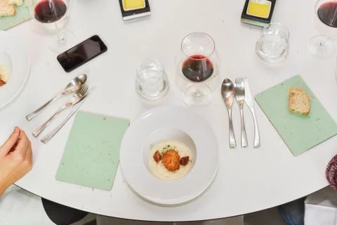 Restaurant table with molecural dish on it Stock Photos