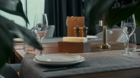 Restaurant table with panoramic windows, glasses and plates awaits guests Stock Footage 315230094