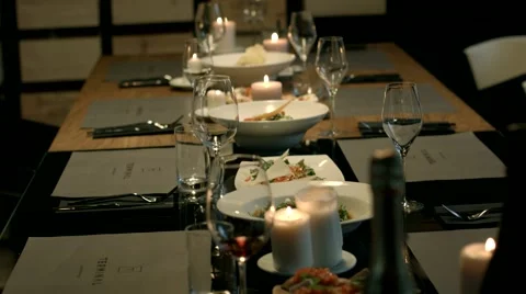 Restaurant table set for a dinner party. Stock Footage 61158031