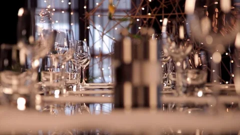Restaurant table set with glassware Stock Footage 75242787