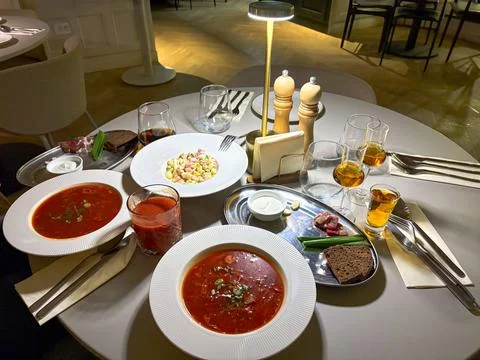 A restaurant table set with traditional Eastern European dishes Foto stock