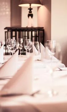 Restaurant table setting, classic interior decor Stock Photos