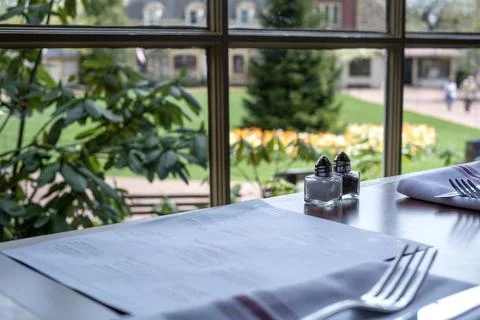 Restaurant Table Setting with Garden View at Peddler's Village PA 写真素材