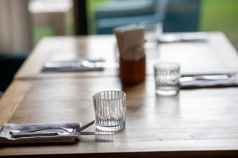 Restaurant table setting wooden tableware Stock Photos