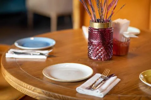 Restaurant table setting wooden tableware Stock Photos