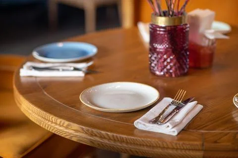 Restaurant table setting wooden tableware Stock Photos