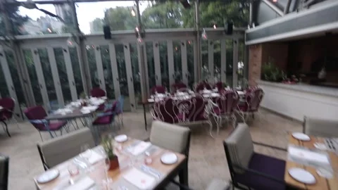 Restaurant tables ready for lunch Stock Footage 131984661