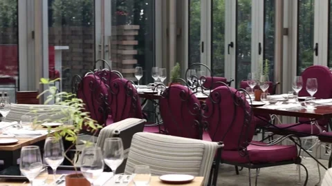 Restaurant tables ready for lunch Stock Footage 131984822