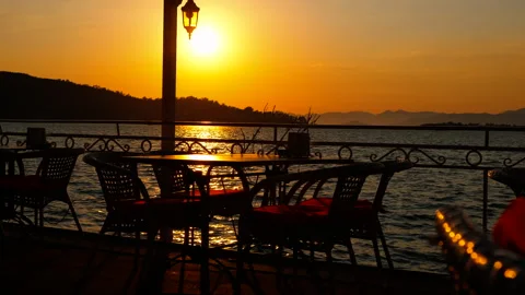 Restaurant tables at sea sunset Stock-Footage 254031887