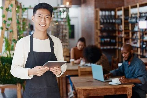 Restaurant, tablet and portrait of man or small business owner, e commerce and Stock Photos