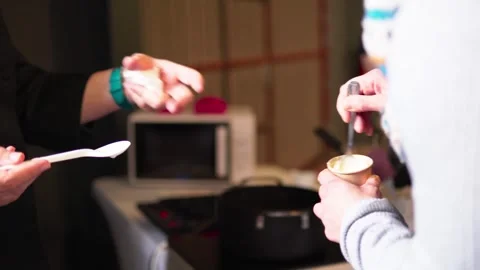 Restaurant trainee shaking mayo sauce Stock Footage 269062990