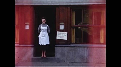 Restaurant waitress or Hostess WS 1957 Stock Footage 48075574
