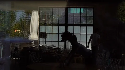 In the restaurant the waitress serves and prepares the table Stock Footage 103469744