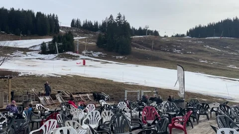 Restaurant of winter sports resort empty because no snow Stock Footage 305152653