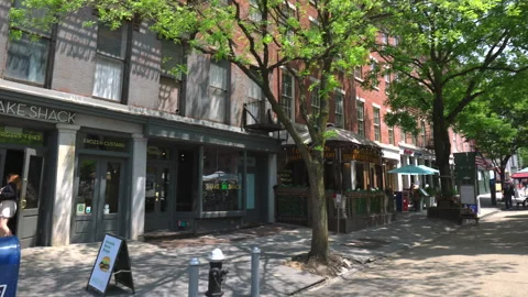 Restaurants are opened along Old Fulton Street in Brooklyn Bridge Park Stock Footage 242125740