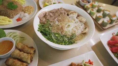 Restaurant's Table Full Of Delicious Vietnamese Specialty Dish. - zoom out Stock Footage 146465900