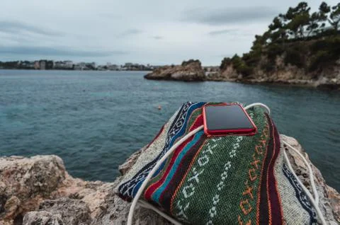 Resting on the beach rocks Stock Photos