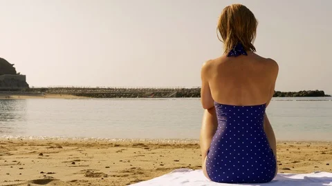 Resting beauty by the beach Video stock 107132330