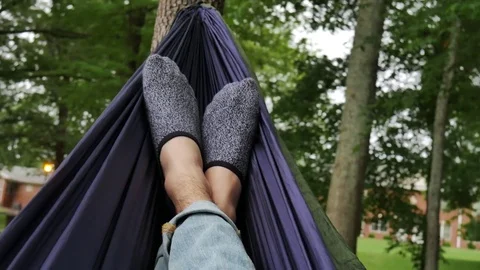 Resting in an eno hammock outside Stock Footage 76222137