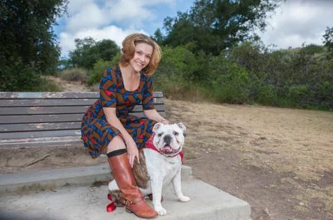 Resting with her dog. Stock Photos