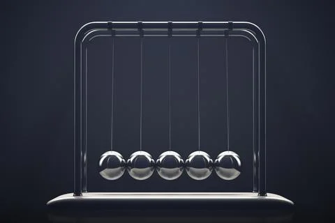Resting newton's cradle. Close-up. Low key. Foto stock