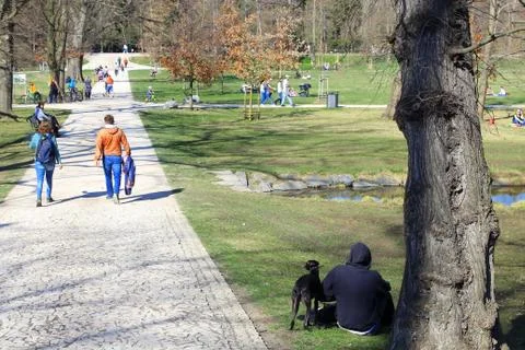 Resting people in the spring park Stock Photos