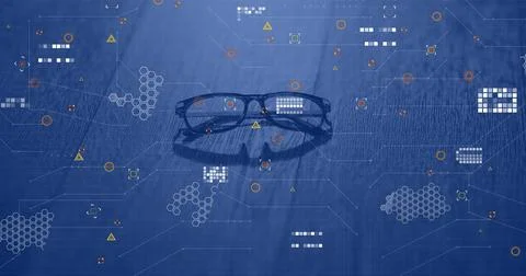 Resting rectangular eyeglasses on wooden tabletop, showing hexagonal mesh and 스톡 사진