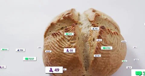 Resting round rustic bread loaf showing social media icons with counters on Stock Photos
