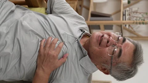 Restless senior man touching chest Video stock 229620625